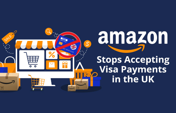 Laptop Displaying Online Store Surrounded by Boxes And a No Visa Credit Card Since Amazon Stop Accepting Them